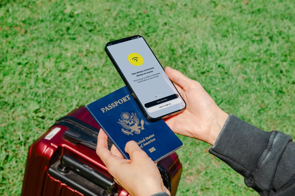 Expat completing a UK ETA application on a laptop in another country