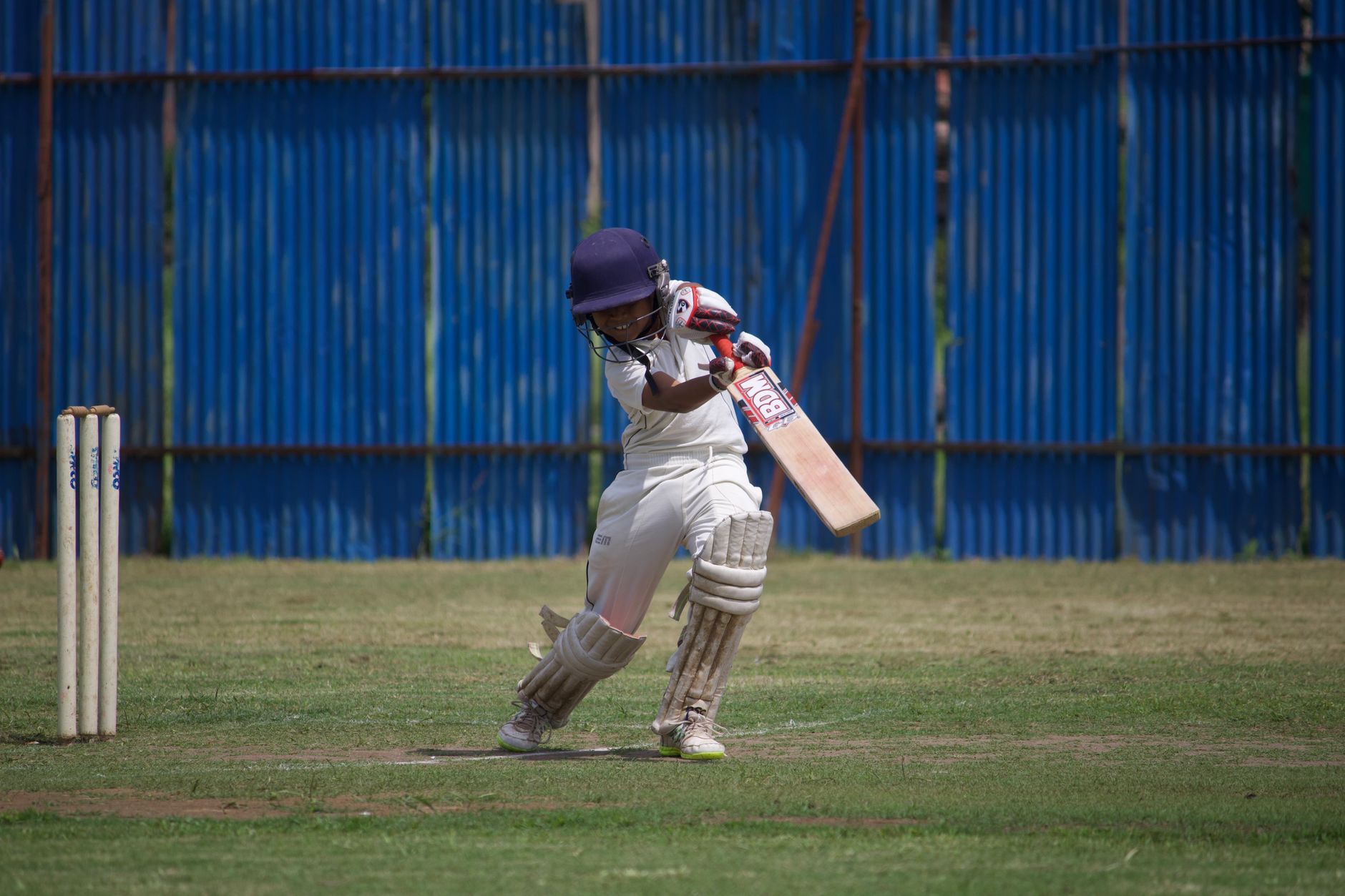 Cricket batsman driving the ball during an England Test match at the Ashes 2027