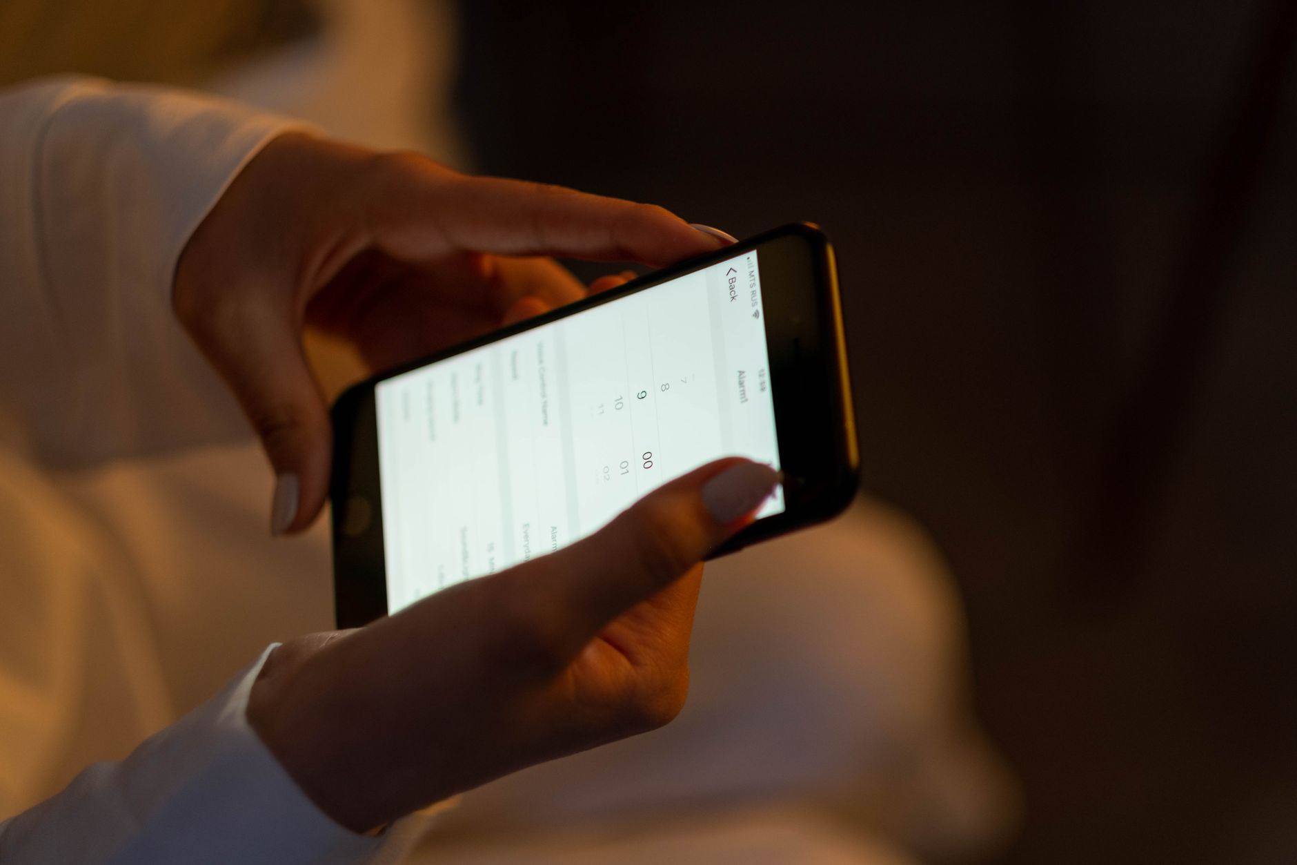 Traveller completing the online UK ETA application on a smartphone before the Ashes